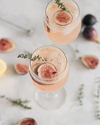 cocktail à base de rosé, agrumes et figues